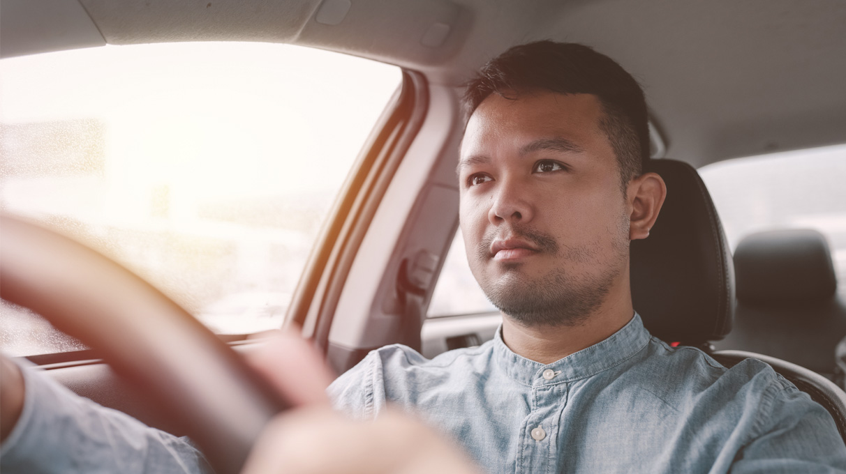 Man driving a car