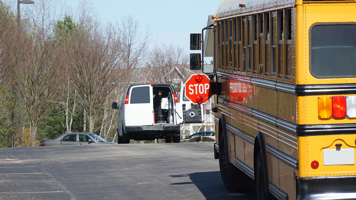 School bus with a stop sign out