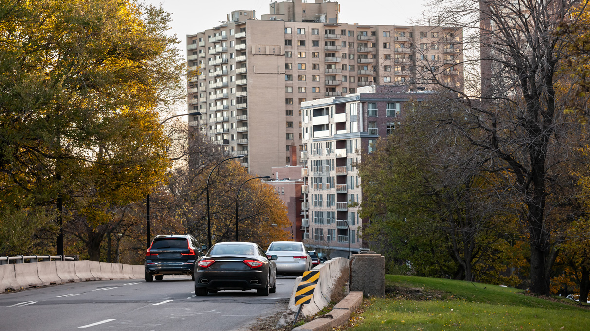 Cars driving down road