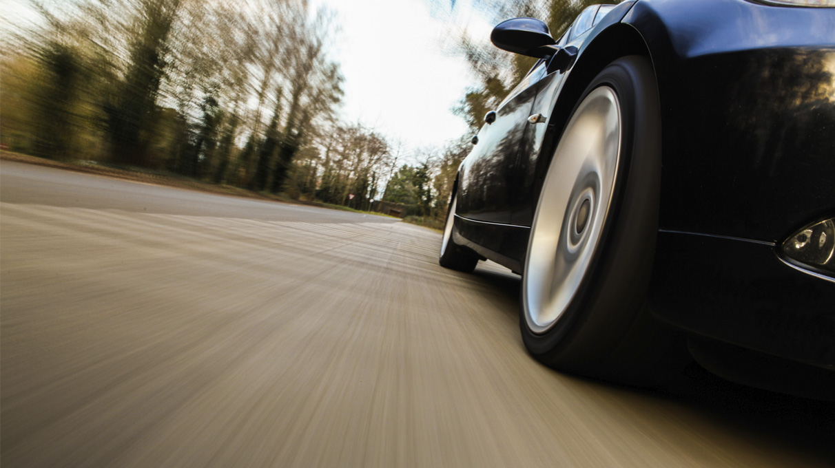 Car speeding down road