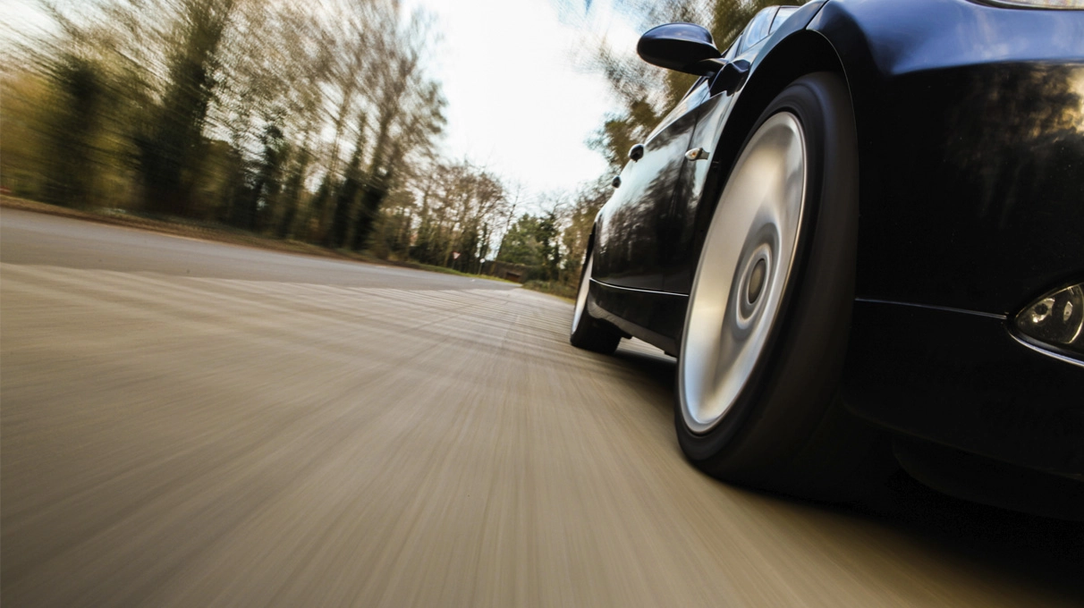 Car speeding down road